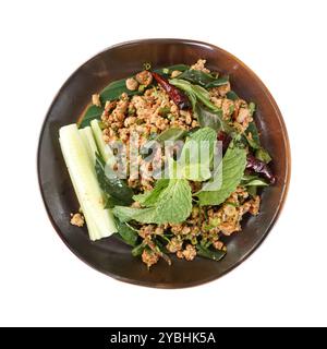 In der Pfanne gebratenes Schweinehackfleisch im nordthailändischen Stil mit gemischten Kräutern. Ein Gericht namens Larb oder Laab - ein Salat aus gemahlenem Fleisch, gemischt mit einer einzigartigen Gewürzmischung Stockfoto