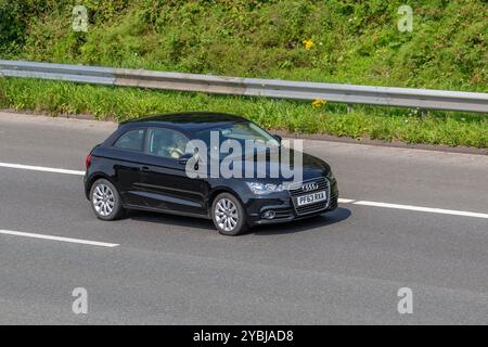 2014 Schwarzer Audi A1 Sport TFSI 122 Start/Stopp Car Hatchback Benzinmotor 1390 ccm auf der Autobahn M6 UK Stockfoto