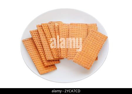 Waffeln mit Schokoladenüberzug. Belgisches Dessert. Waffeln auf Keramikplatte. Isolieren auf weißem Hintergrund. Stockfoto