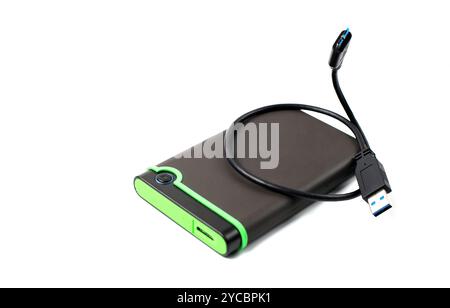 Externe Festplatte zur Sicherung auf weißem Hintergrund in Nahaufnahme. Stockfoto