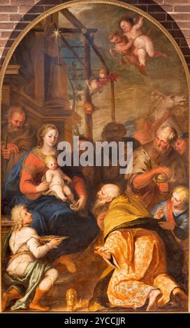 PAVIA, ITALIEN - 9. SEPTEMBER 2024: Gemälde der Anbetung der Könige in der Kirche Chiesa di San Teodoro von Calro Sacchi (1616–1707). Stockfoto