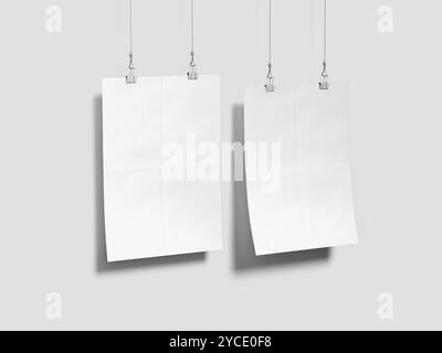 Zwei weiße hängende Poster auf Einem 3D-Rendering-Modell an der Wand Stockfoto