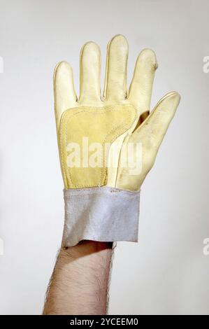 Schutzhandschuh auf weißem Hintergrund Stockfoto