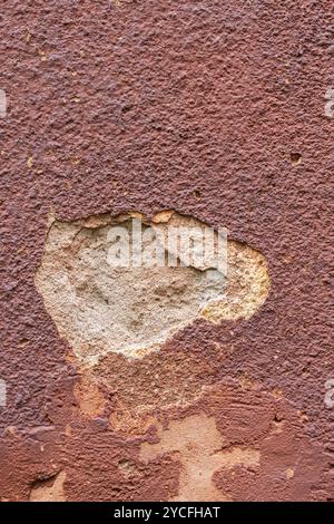 Wand eines alten Gebäudes, zerbröckelnder Putz, Hausfassade, Hintergrundbild Stockfoto