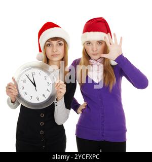 Freunde zeigen, wie wenig Zeit bis Neujahr bleibt Stockfoto