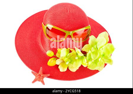 Roter Strohhut der Frau mit Orchideenblüten Stockfoto