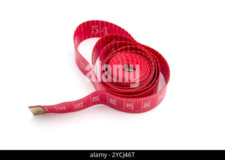 Roten Maßband Closeup auf weißem Hintergrund Stockfoto