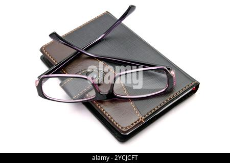 Notebook und Gläser Stockfoto