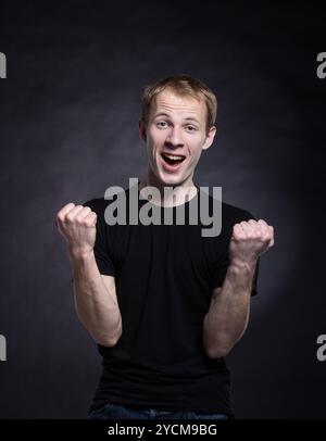 Siegerposition des Mannes Stockfoto