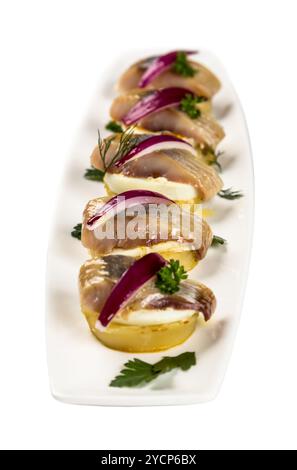 Restourant Servierplatte - Stücke Hering für Snack auf weißem Hintergrund Stockfoto