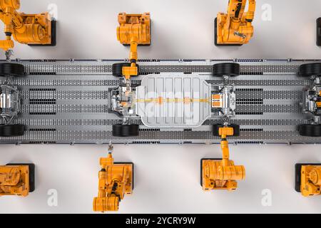 Automatisierung Automobilfabrik-Konzept mit 3D-Rendering-Roboter-Montagelinie mit Elektroauto-Batteriezellen-Modul auf Plattform Draufsicht Stockfoto