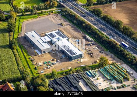 Luftbild, Gewerbegebiet Heelden an der Autobahn A3 Anschlussstelle Rees, Bundesstraße B67, Baustelle mit Neubau Anhängerzentrum Baumann, Heelden, Isselburg, Nordrhein-Westfalen, Deutschland ACHTUNGxMINDESTHONORARx60xEURO *** Stockfoto