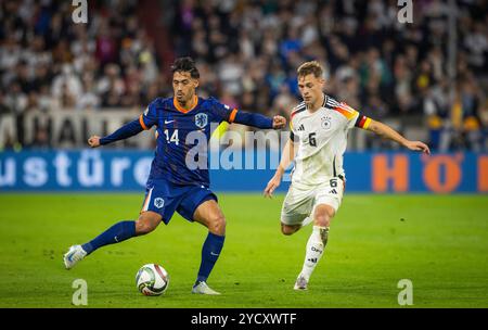 München, Deutschland. Oktober 2024. Tijjjani Reijnders (NED) Joshua Kimmich (DFB) Deutschland - Niederlande Deutschland - Niederlande 14.10.2024 Copyright ( Stockfoto