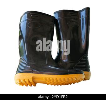 Ein Paar hohe schwarze Gummistiefel oder Gummistiefel ist auf weißem Hintergrund mit Beschneidungspfad isoliert. Stockfoto