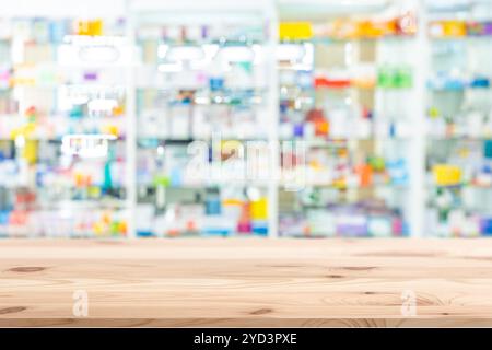 Hintergrundinformationen zu Apotheken. Unschärfe für den Hintergrund im Drogeriemarkt. Medizin Vitaminpräparate Werbung Hintergrund Holz Tischplatte. Stockfoto