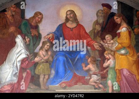 Jesus segnet die Kinder, mit Fresken verzierte Lunette, Ospedale degli Innocenti - Außen Arcade, Florenz, Italien Stockfoto