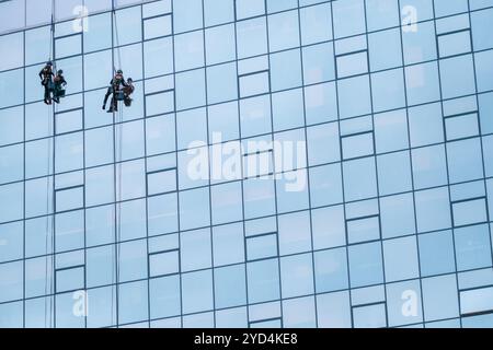 Wolkenkratzer Fensterputzer Stockfoto