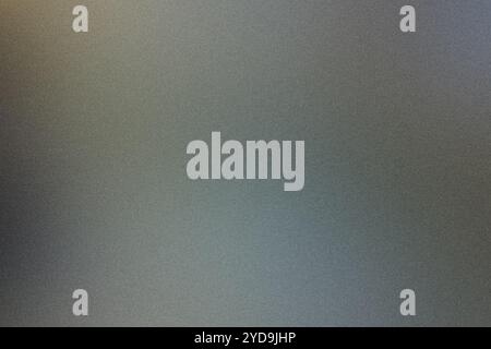 Ein körniger verlaufender Hintergrund erzeugt ein abstraktes und strukturiertes Design Stockfoto