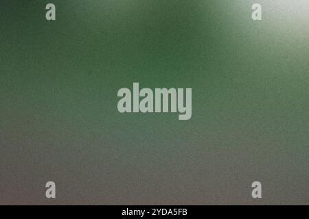 Grüner und grauer Farbverlauf mit körniger Textur, geeignet für Hintergründe und Tapeten Stockfoto