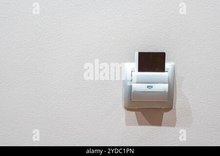 Schlüsselkarte in einen Hotelzimmer-Cardreader Stockfoto