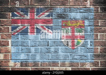 Fidschi-Flagge auf Backsteinmauern Stockfoto