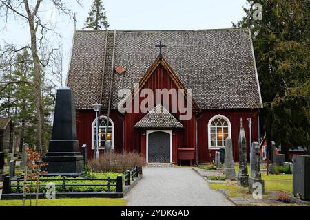 Sammatti-Kirche. Die 1754-555 erbaute rote Holzkirche ist eine der ältesten Holzkirchen der ganzjährigen Nutzung in Finnland. Sammatti, FI. Februar Stockfoto