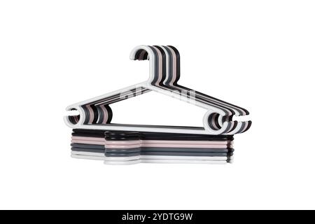 Set aus mehrfarbigen Kleiderbügeln aus Kunststoff für organisierte Garderobe – langlebige und stilvolle Kleiderbügel für effiziente Aufbewahrung im Schrank Stockfoto