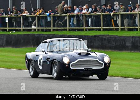 Jimmie Johnson, Dario Franchitti, Aston Martin DB4GT, Stirling Moss Memorial Trophy, mit GT-Fahrzeugen mit geschlossenem Cockpit, die vor 1963 gefahren wurden Stockfoto