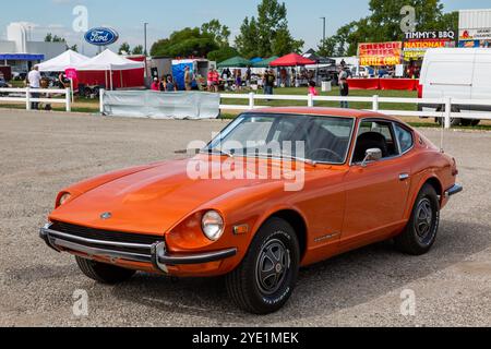 Ein orangener Datsun 240Z Sportwagen bei der Auburn Auction der Worldwide Auctioneers' Auction in Auburn, Indiana, USA. Stockfoto