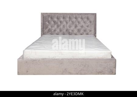 Doppelbett mit weichem Kopfteil. Gepolsterte Möbel. Stockfoto