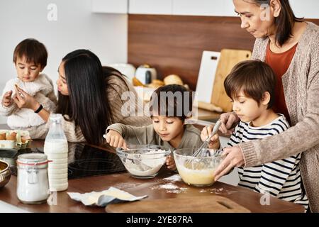 Eine fröhliche Familie versammelt sich in einer modernen Küche und backt fröhlich festliche Köstlichkeiten zu Weihnachten zusammen. Stockfoto