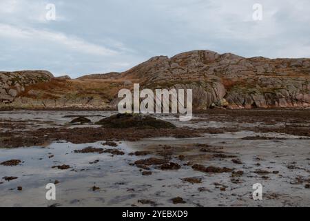 Roter Granit am Fionnphort Beach, Isle of Mull, Schottland Stockfoto