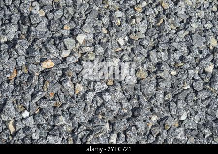 Feiner grauer, zerquetschter Stein, strukturierter Hintergrund, Vollrahmen. Verwendung als Baumaterial im Bauwesen Stockfoto