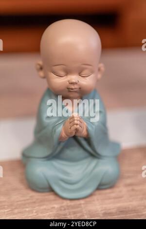 Nahaufnahme einer Buddha-Figur in der Meditation Stockfoto