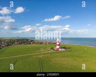 Happisburgh Lighthouse North Norfolk Coast leidet stark unter Küstenerosion Stockfoto