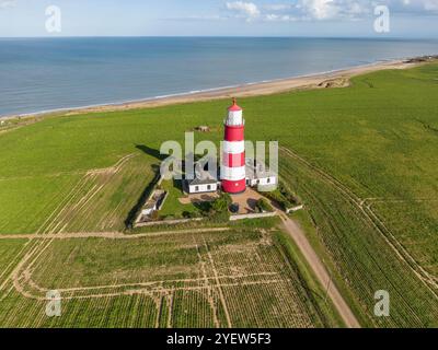 Happisburgh Lighthouse North Norfolk Coast leidet stark unter Küstenerosion Stockfoto