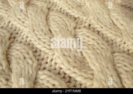 Winter Wollstrick beige Pullover Bekleidung. Textiler Hintergrund Stockfoto