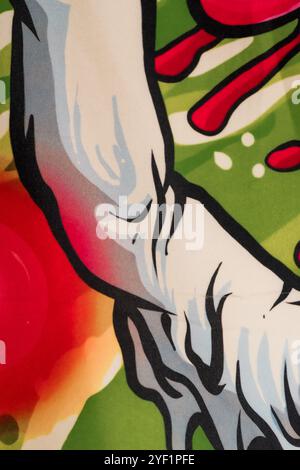 Lebendiges abstraktes Kunstwerk mit stilisiertem Arm und farbenfroher Kulisse. Stockfoto