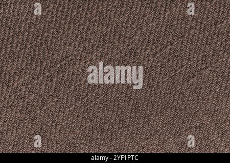 Brauner Jacquard-Stoff mit diagonal gewebtem, grobgewebtem Polsterstoff. Textilhintergrund, Möbel Textilmaterial, Tapete, Hintergrund Stockfoto
