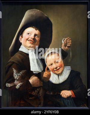 Ein Junge und ein Mädchen mit einer Katze und einem Aal, um 1635, Judith Leyster (1609–1660), die National Gallery, London, UK. Stockfoto