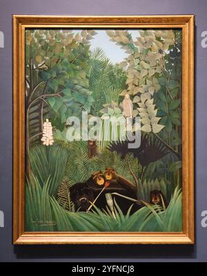 Das Gemälde der fröhliche Narren des französischen Künstlers Henri Rousseau. Surreales Thema von Affen, Milch. Im Philadelphia Museum of Art in Pennsylvania. Stockfoto