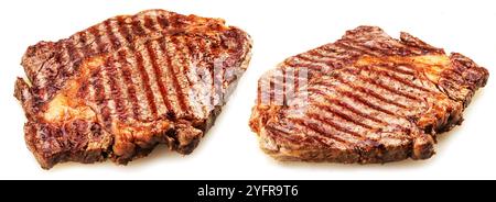 Zwei gegrillte köstliche Ribeye-Steaks auf weißem Hintergrund. Stockfoto