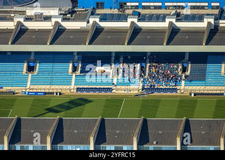 Luftbild, Vonovia Ruhrstadion Fußballstadion und Bundesligastadion des VfL Bochum 1848, Tribüne und vereinzelte Zuschauer, Grumme, Bochum, Ruhrgebiet, Nordrhein-Westfalen, Deutschland ACHTUNGxMINDESTHONORARx60xEURO *** Luftaufnahme, Vonovia Ruhrstadion und Bundesligastadion des VfL Bochum 1848, Tribüne und isolierte Zuschauer, Grumme, Bochum, Ruhrgebiet Nordrhein-Westfalen, Deutschland ATTENTIONxMINDESTHONORARx60xEURO Stockfoto