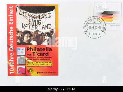 Brief mit gestempelter Briefmarke, gedruckt von Deutschland, mit deutscher Flagge, 10. Jahrestag der Wiedervereinigung Deutschlands, um 2000. Stockfoto