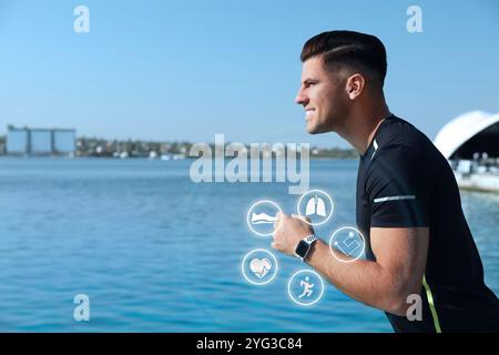 Mann mit intelligenter Uhr, der draußen in der Nähe des Flusses läuft. Symbole in der Nähe des Geräts Stockfoto