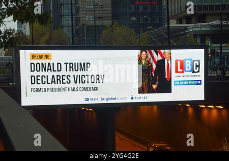 London, Großbritannien. November 2024. Eine digitale Plakatwand in Zentral-London zeigt eine Nachricht von LBC, dass Donald Trump die US-Wahl gegen Kamala Harris gewonnen hat. Quelle: Vuk Valcic/Alamy Live News Stockfoto