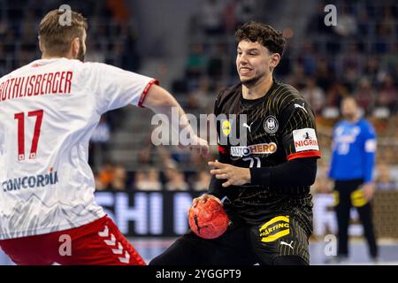 Marko GRGIC (DHB Nationalmannschaft Deutschland, #71) im Zweikampf gegen Samuel ROEHTLISBERGER (Handball Schweiz Suisse, #17) Handball-Nationalmannschaft Deutschland DHB (GER) vs. Handball Schweiz Suisse (SUI), Handball, Maenner, EHF EURO Qualifikation, 1. Spieltag, Spielzeit 2024/2025, 07.11.2024 Foto: Eibner-Pressefoto/Oliver Schmidt Stockfoto