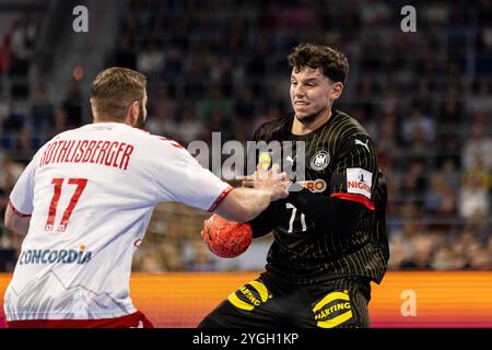 Marko GRGIC (DHB Nationalmannschaft Deutschland, #71) im Zweikampf gegen Samuel ROEHTLISBERGER (Handball Schweiz Suisse, #17) Handball-Nationalmannschaft Deutschland DHB (GER) vs. Handball Schweiz Suisse (SUI), Handball, Maenner, EHF EURO Qualifikation, 1. Spieltag, Spielzeit 2024/2025, 07.11.2024 Foto: Eibner-Pressefoto/Oliver Schmidt Stockfoto