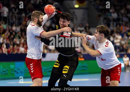 Marko GRGIC (DHB Nationalmannschaft Deutschland, #71) im Zweikampf gegen Samuel ROEHTLISBERGER (Handball Schweiz Suisse, #17) links Handball-Nationalmannschaft Deutschland DHB (GER) vs. Handball Schweiz Suisse (SUI), Handball, Maenner, EHF EURO Qualifiers, 1. Spieltag, Spielzeit 2024/2025, 07.11.2024 Foto: Eibner-Pressefoto/Oliver Schmidt Stockfoto