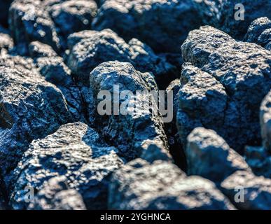 Abstrakte natürliche Textur vulkanischer Stein, Lavastein, magmatisches Gestein, das aus Magma gebildet wird, das nach einem Vulkanausbruch abkühlt Stockfoto